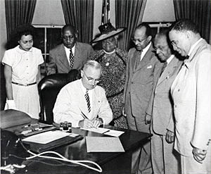 President Harry Truman signing legislation establishing February 1 as National Freedom Day, June 30, 1948